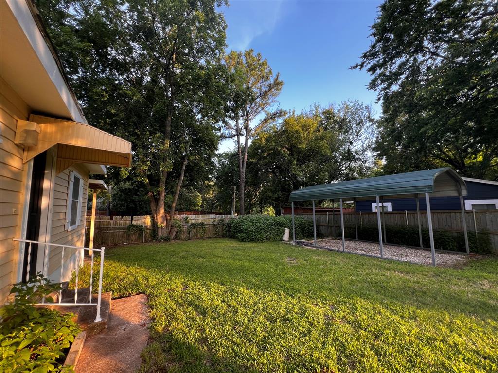 1036 Paradise Cove Road Pottsboro, TX 75076 - Photo 33 of 40 a view of a house with backyard and sitting area