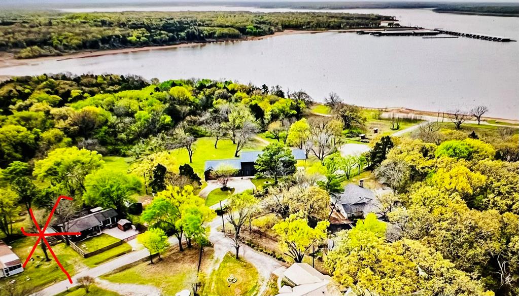 1036 Paradise Cove Road Pottsboro, TX 75076 - Photo 40 of 40 a view of a lake with a lake view