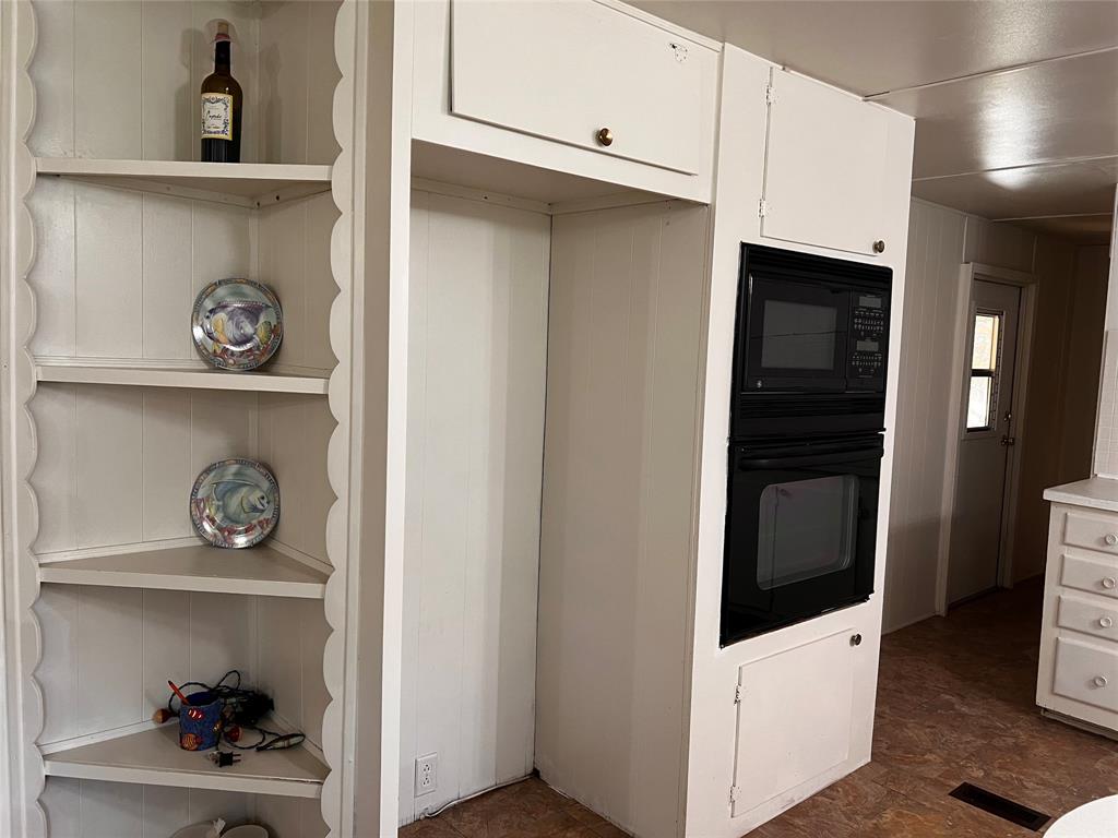 1036 Paradise Cove Road Pottsboro, TX 75076 - Photo 6 of 40 a view of an entryway with wooden floor