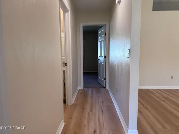 a backyard of a house with wooden fence