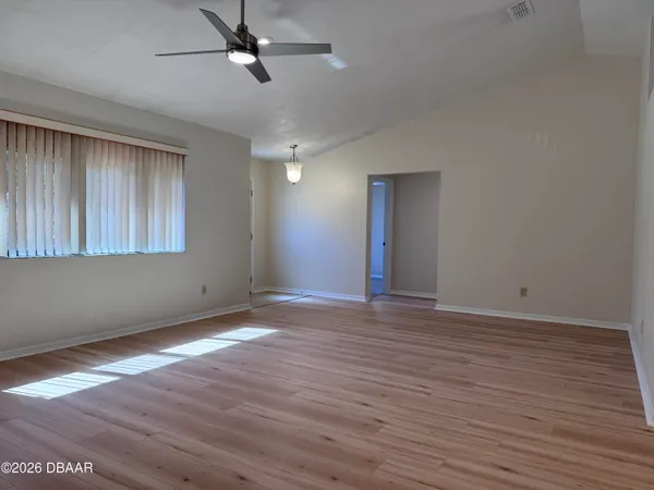 a kitchen with a refrigerator stove and microwave