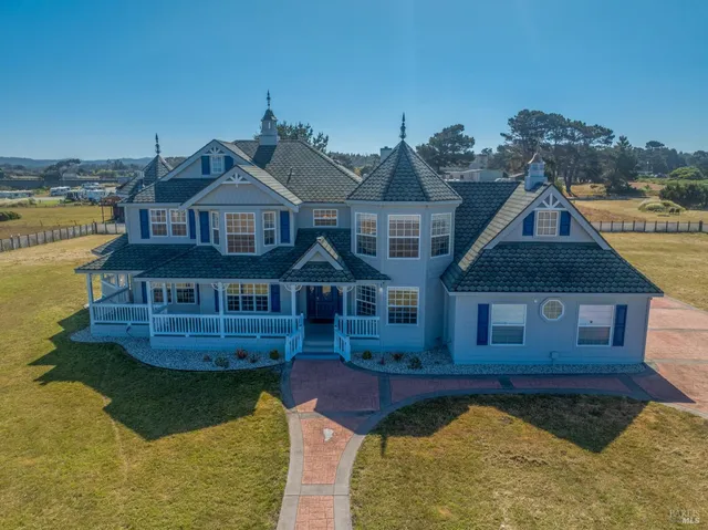a view of a house with swimming pool