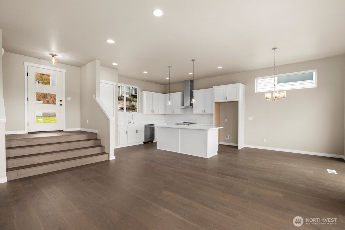 2216 Cleven Park Road Camano Island, WA 98282 - Photo 17 of 38 a view of kitchen with cabinets and wooden floor