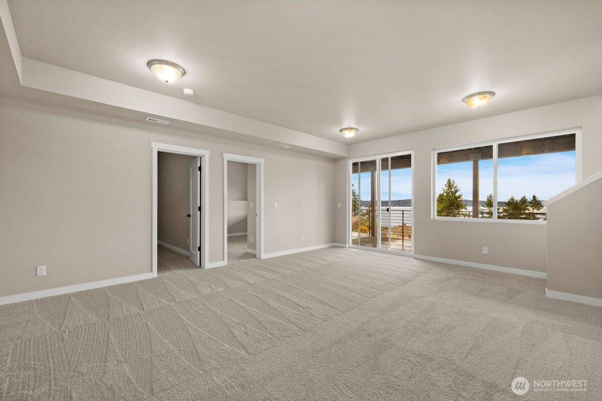2216 Cleven Park Road Camano Island, WA 98282 - Photo 28 of 38 a view of an empty room with a window