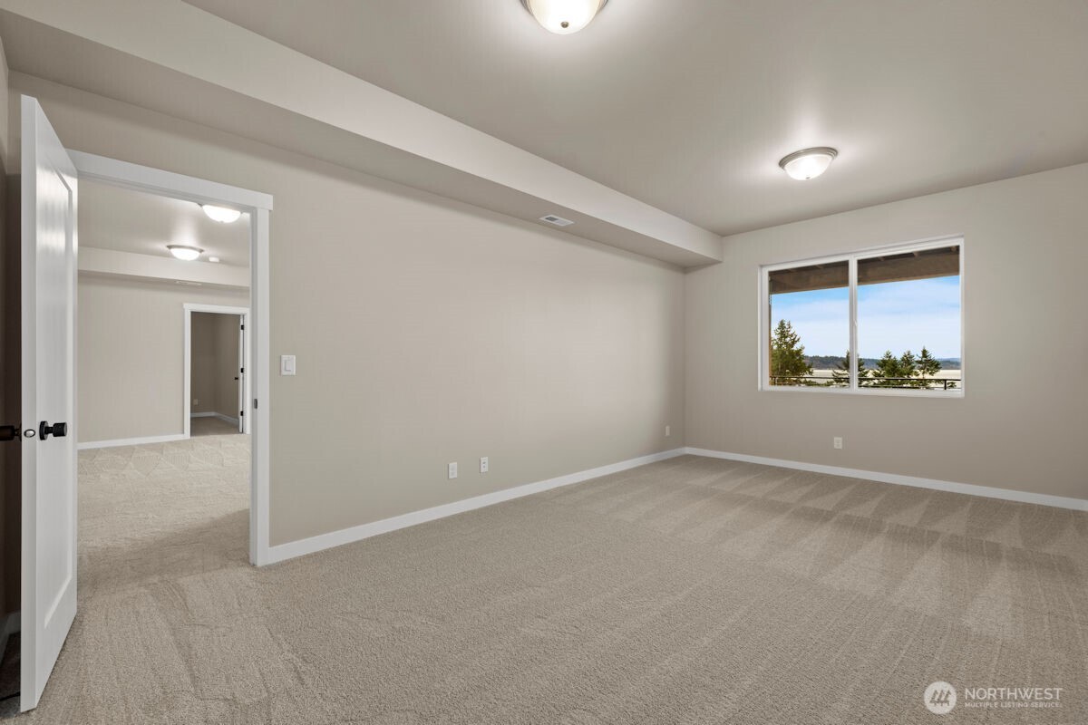 2216 Cleven Park Road Camano Island, WA 98282 - Photo 35 of 38 an empty room with a empty space and window
