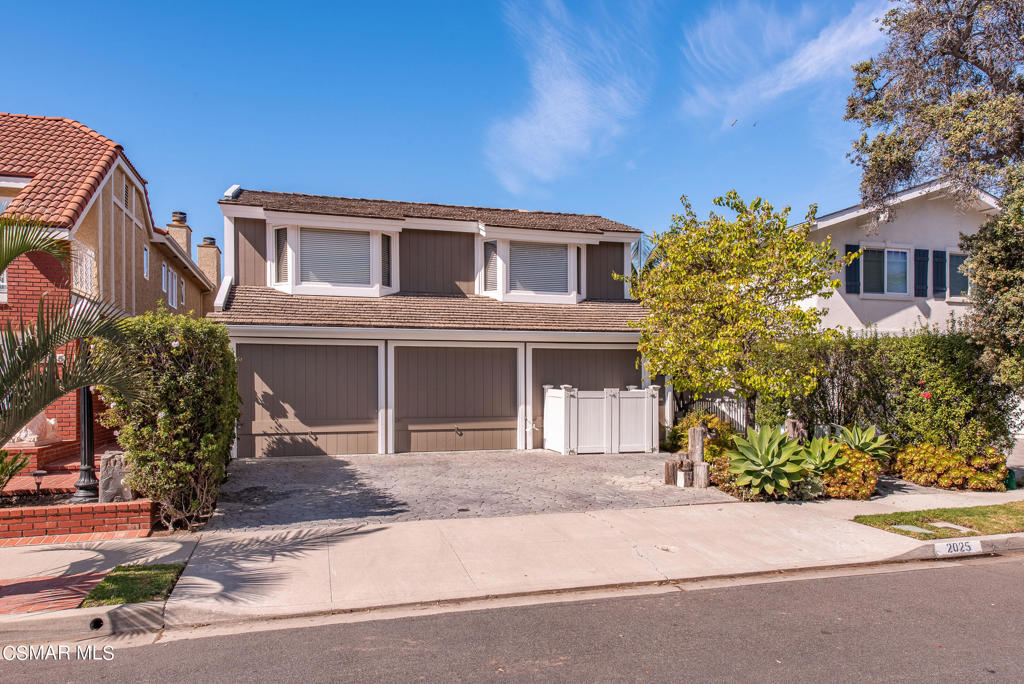 2025 Napoli Drive Oxnard, CA 93035 - Photo 1 of 47 a front view of a house with a yard