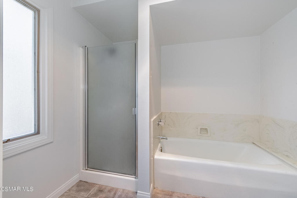 2025 Napoli Drive Oxnard, CA 93035 - Photo 24 of 47 a bathroom with a bathtub