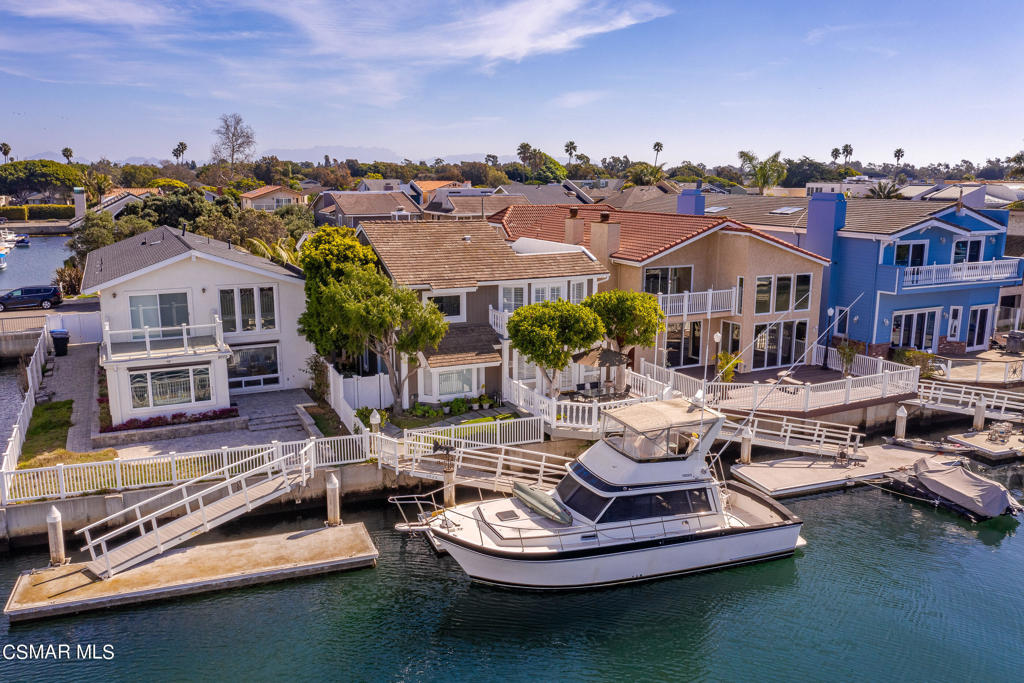 2025 Napoli Drive Oxnard, CA 93035 - Photo 38 of 47 a view of a lake with couches and city view