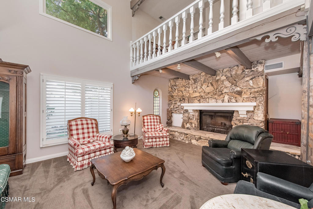 2025 Napoli Drive Oxnard, CA 93035 - Photo 7 of 47 a living room with furniture and a fireplace