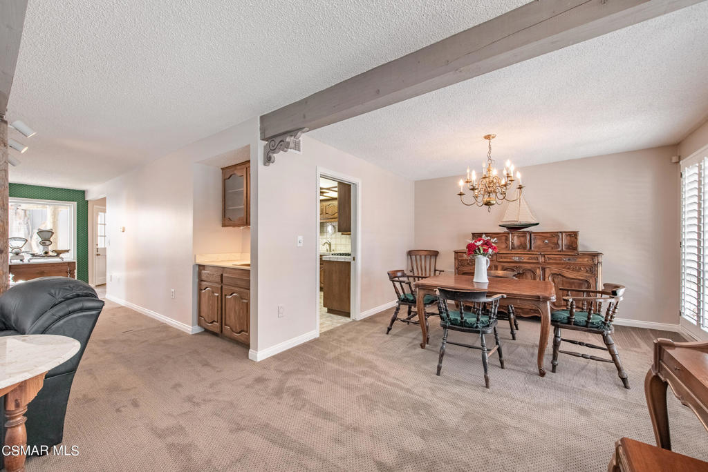 2025 Napoli Drive Oxnard, CA 93035 - Photo 9 of 47 a view of a dining room with furniture and chandelier