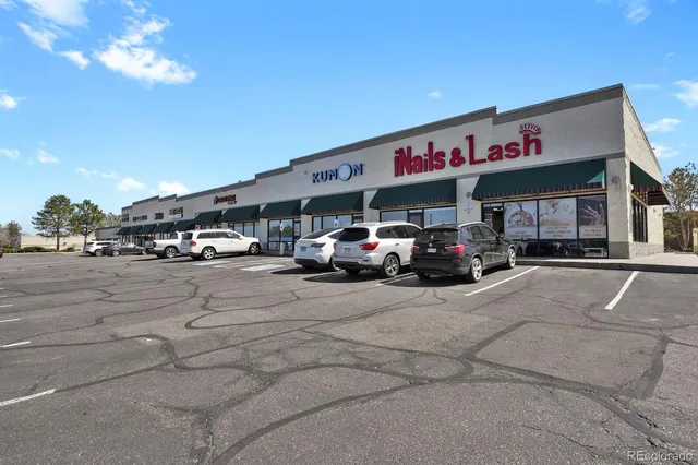 a car parked in front of a building