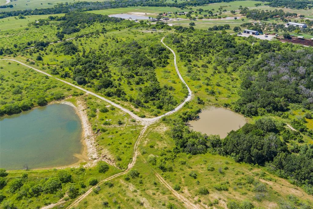 Tbd Adell Weatherford, TX 76088 - Photo 13 of 39 an aerial view of residential houses with outdoor space and trees