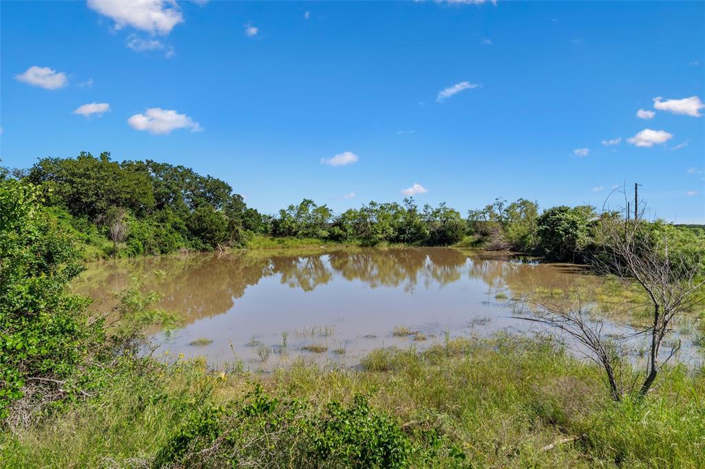 Tbd Adell Weatherford, TX 76088 - Photo 21 of 39 a view of a lake from a yard