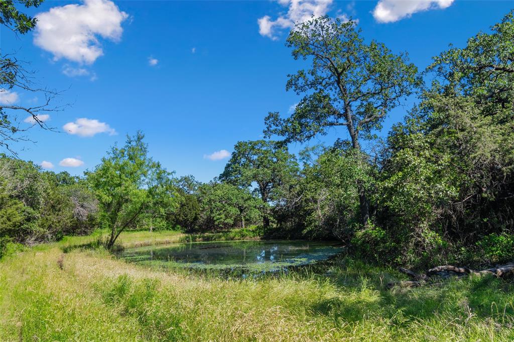 Tbd Adell Weatherford, TX 76088 - Photo 27 of 39 a view of a lake with houses in background