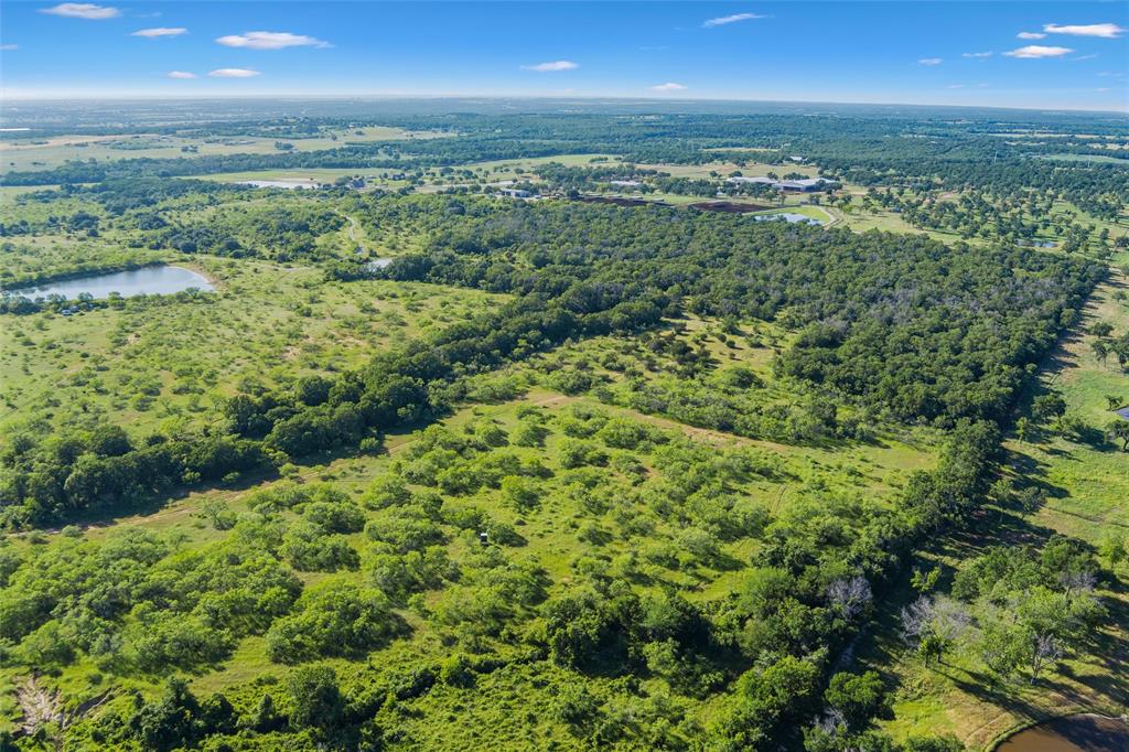 Tbd Adell Weatherford, TX 76088 - Photo 7 of 39 an aerial view of residential houses with outdoor space and trees