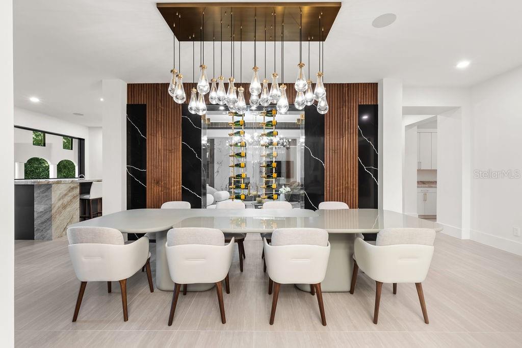 9725 Chestnut Ridge Drive Windermere, FL 34786 - Photo 15 of 55 a view of a dining room with furniture and wooden floor