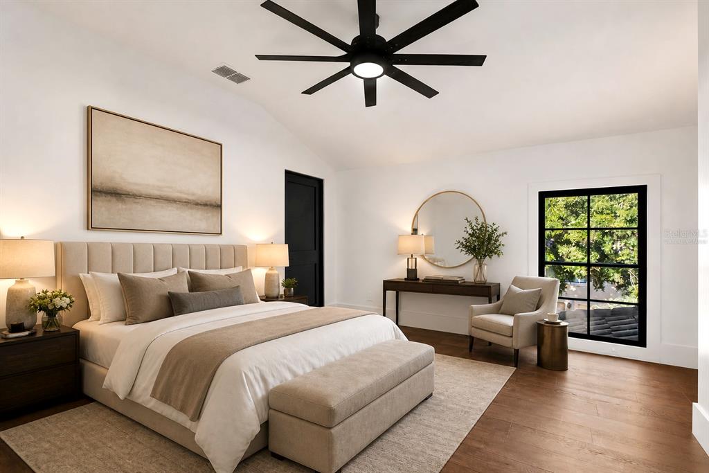 9725 Chestnut Ridge Drive Windermere, FL 34786 - Photo 36 of 61 a bedroom with a bed wooden floor and window