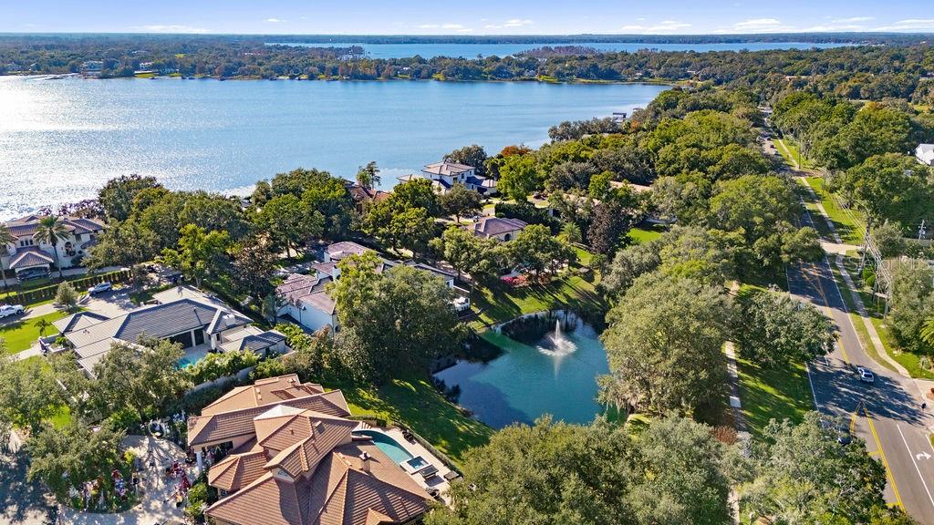 9725 Chestnut Ridge Drive Windermere, FL 34786 - Photo 61 of 61 an aerial view of a house with a lake view