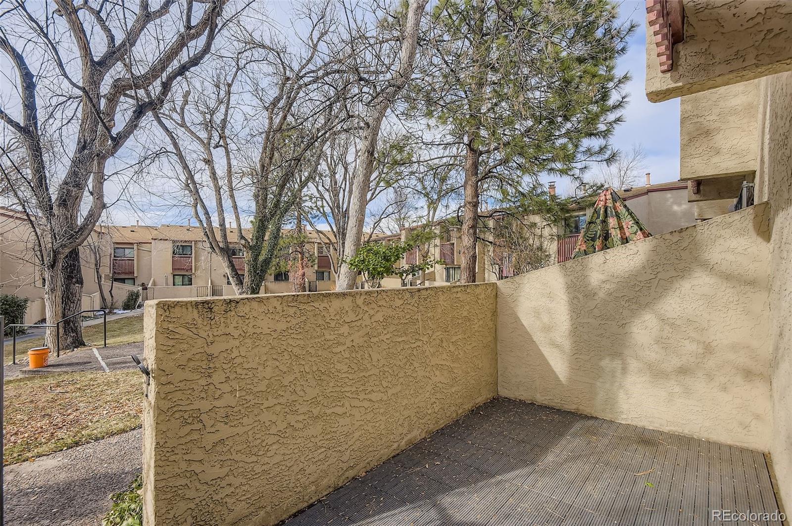 1060 South Parker Road, Unit 25 Denver, CO 80231 - Photo 25 of 26 a view of outdoor space and tree