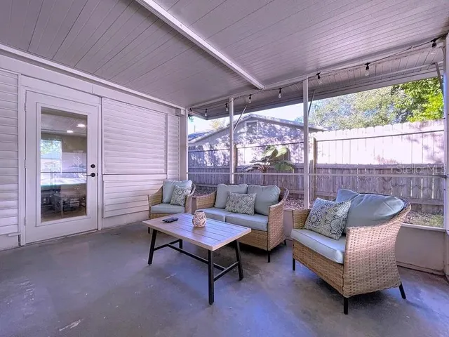 a outdoor living space with furniture and garden view
