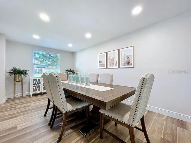 a view of a dining room with furniture