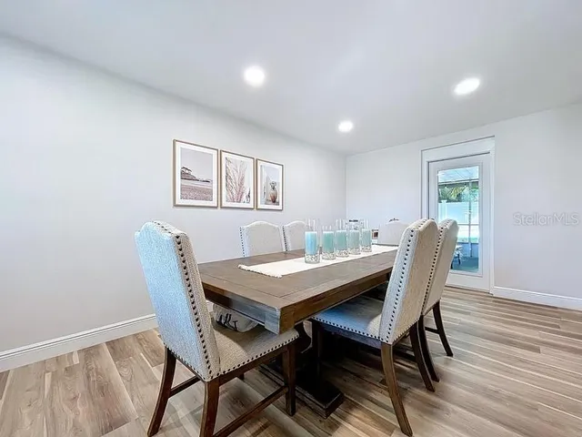 a view of a dining room with furniture