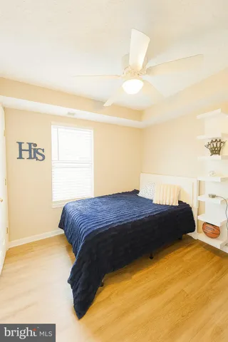 a bedroom with a bed and a cabinets