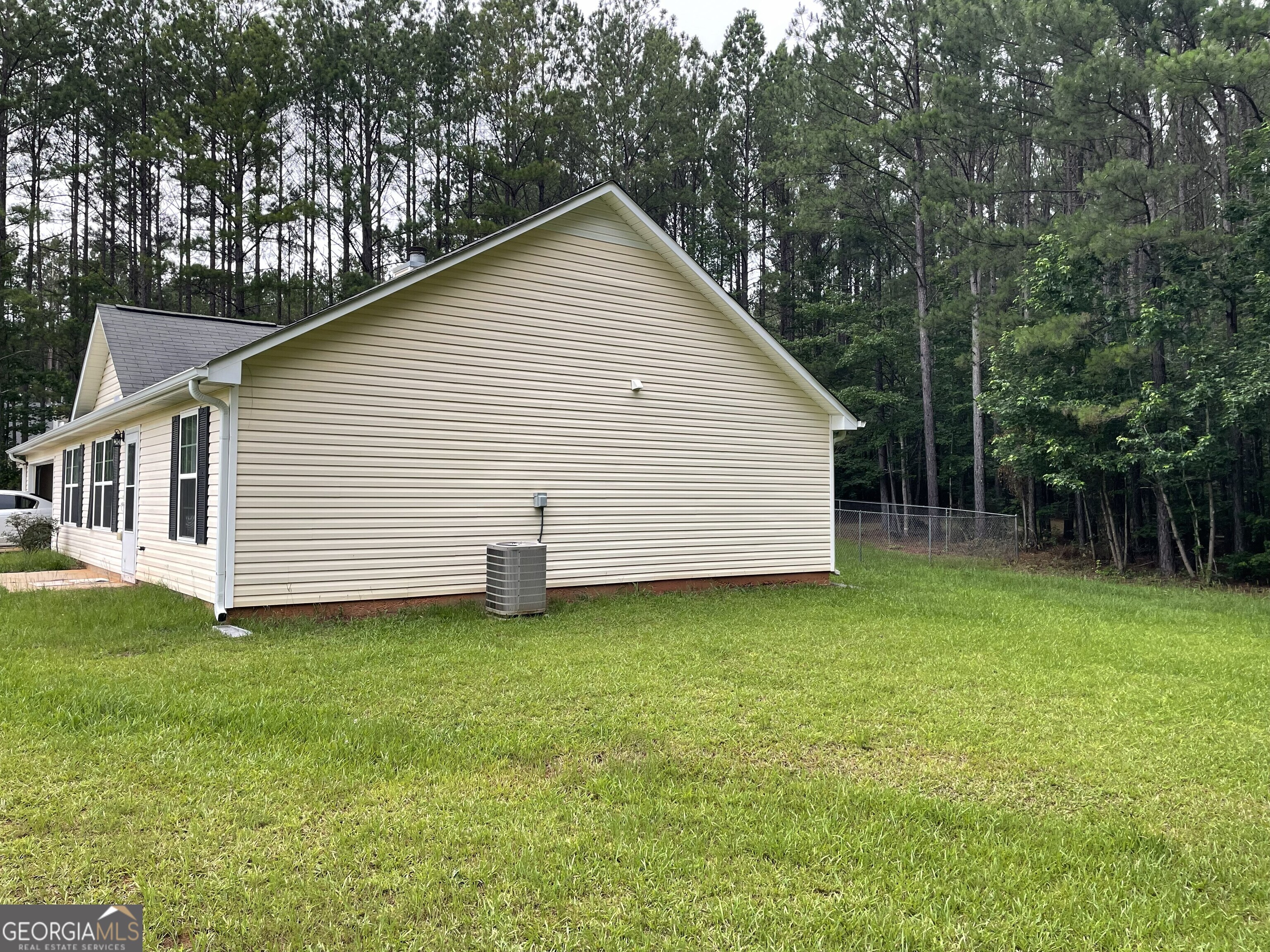 134 Cemetary Road Luthersville, GA 30251 - Photo 15 of 18 a view of a house with backyard