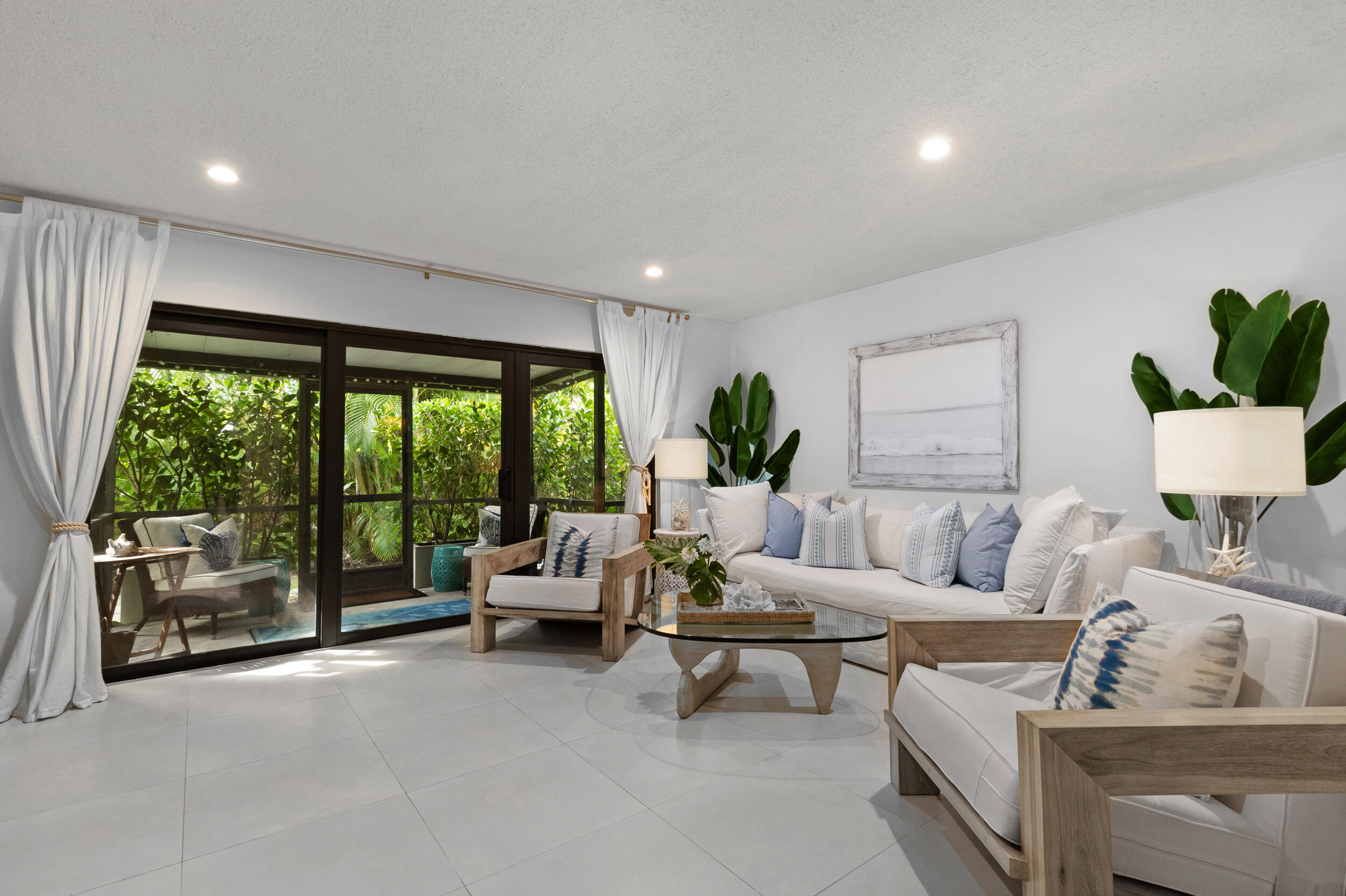 2136 Northeast 44th Street, Unit 4 Lighthouse Point, FL 33064 - Photo 14 of 51 a living room with furniture and a large window