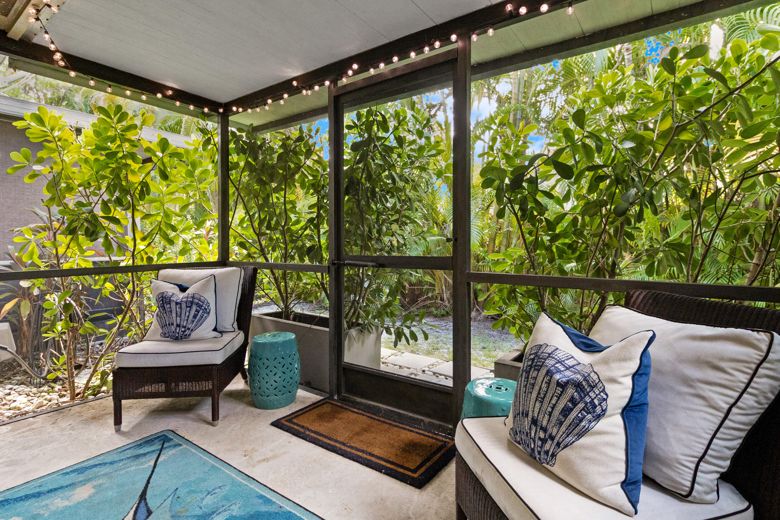 2136 Northeast 44th Street, Unit 4 Lighthouse Point, FL 33064 - Photo 20 of 51 a view of a chair and table in the balcony