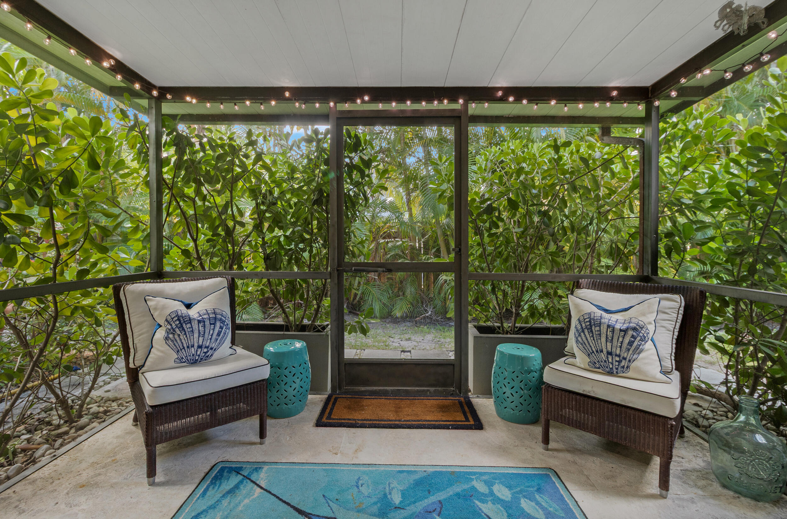 2136 Northeast 44th Street, Unit 4 Lighthouse Point, FL 33064 - Photo 21 of 51 a outdoor living space with furniture and a garden