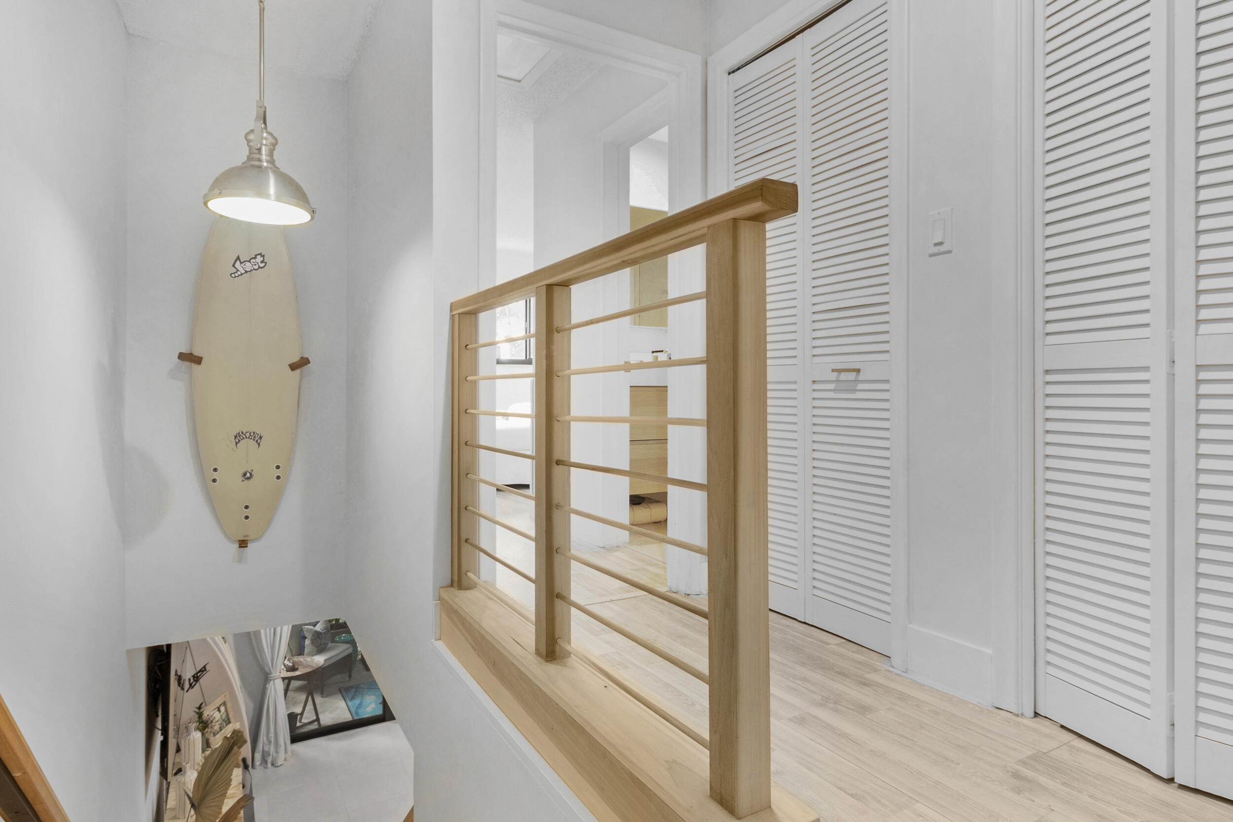 2136 Northeast 44th Street, Unit 4 Lighthouse Point, FL 33064 - Photo 26 of 51 a view of a hallway with windows