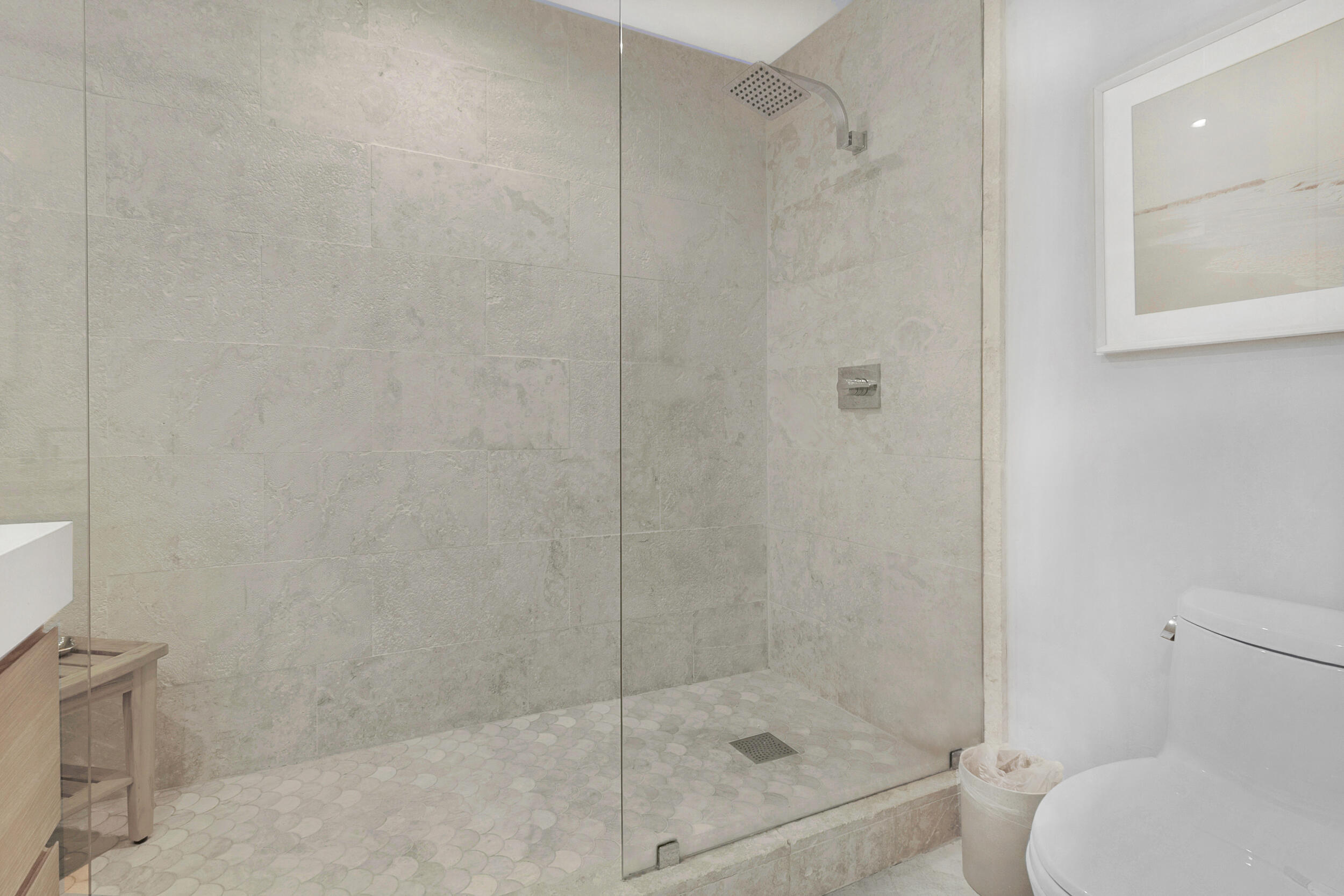 2136 Northeast 44th Street, Unit 4 Lighthouse Point, FL 33064 - Photo 35 of 51 a bathroom with a shower and toilet