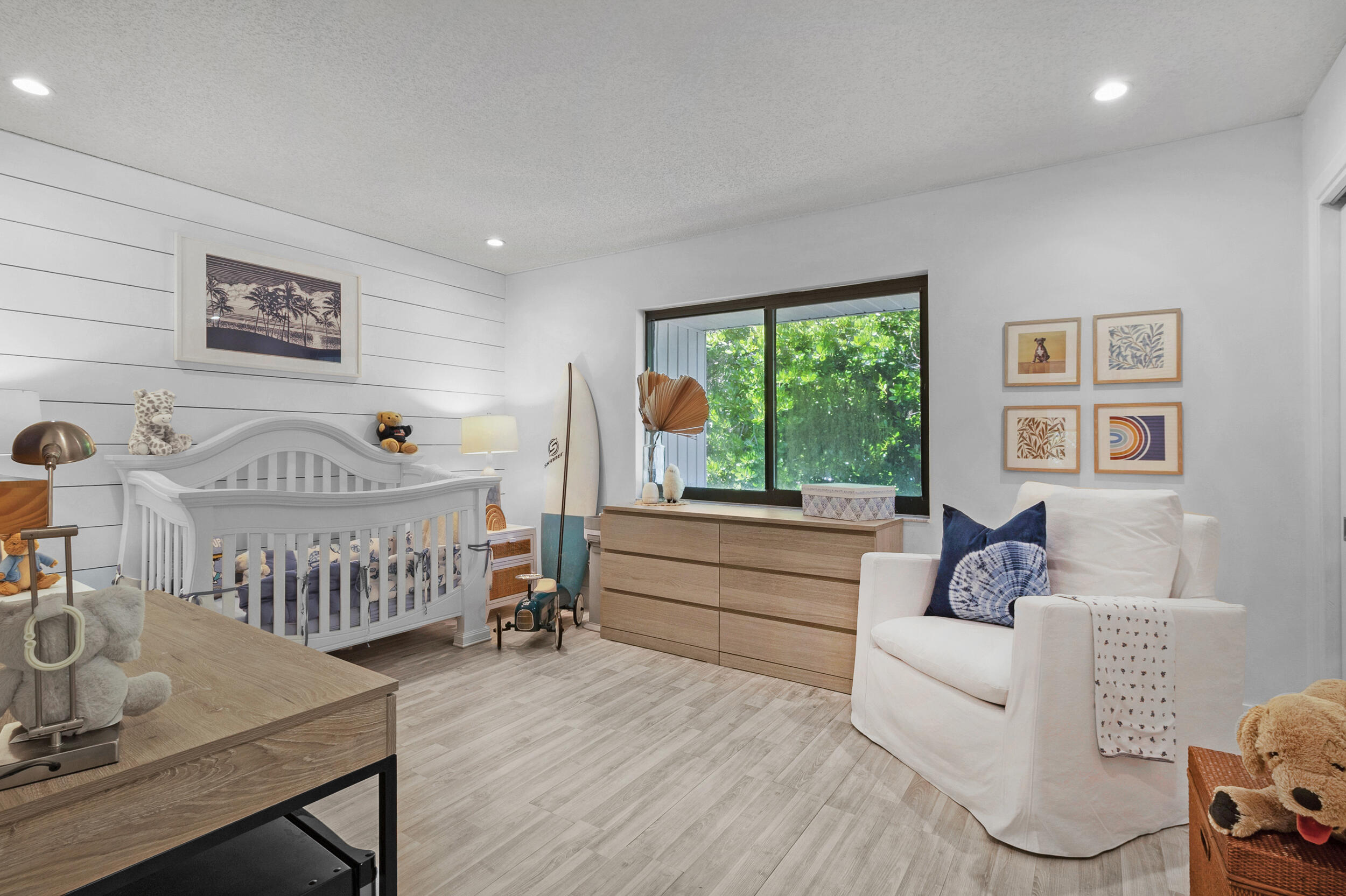 2136 Northeast 44th Street, Unit 4 Lighthouse Point, FL 33064 - Photo 37 of 51 a bedroom with furniture and a large window