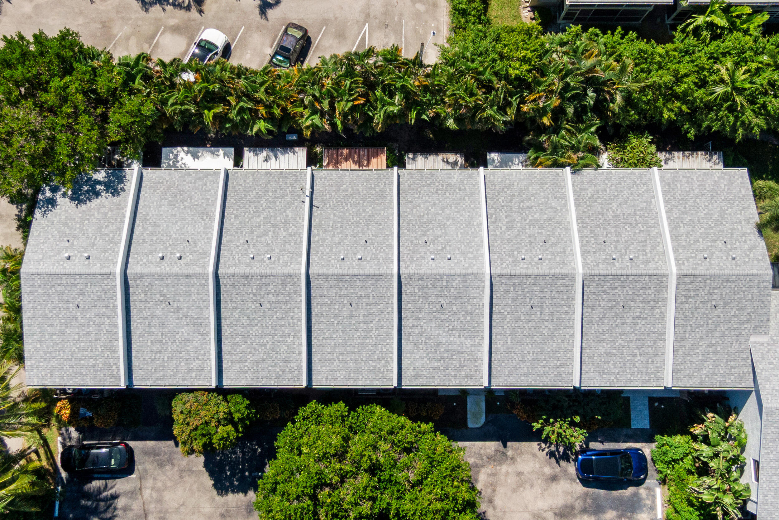 2136 Northeast 44th Street, Unit 4 Lighthouse Point, FL 33064 - Photo 44 of 51 a view of a backyard with potted plants