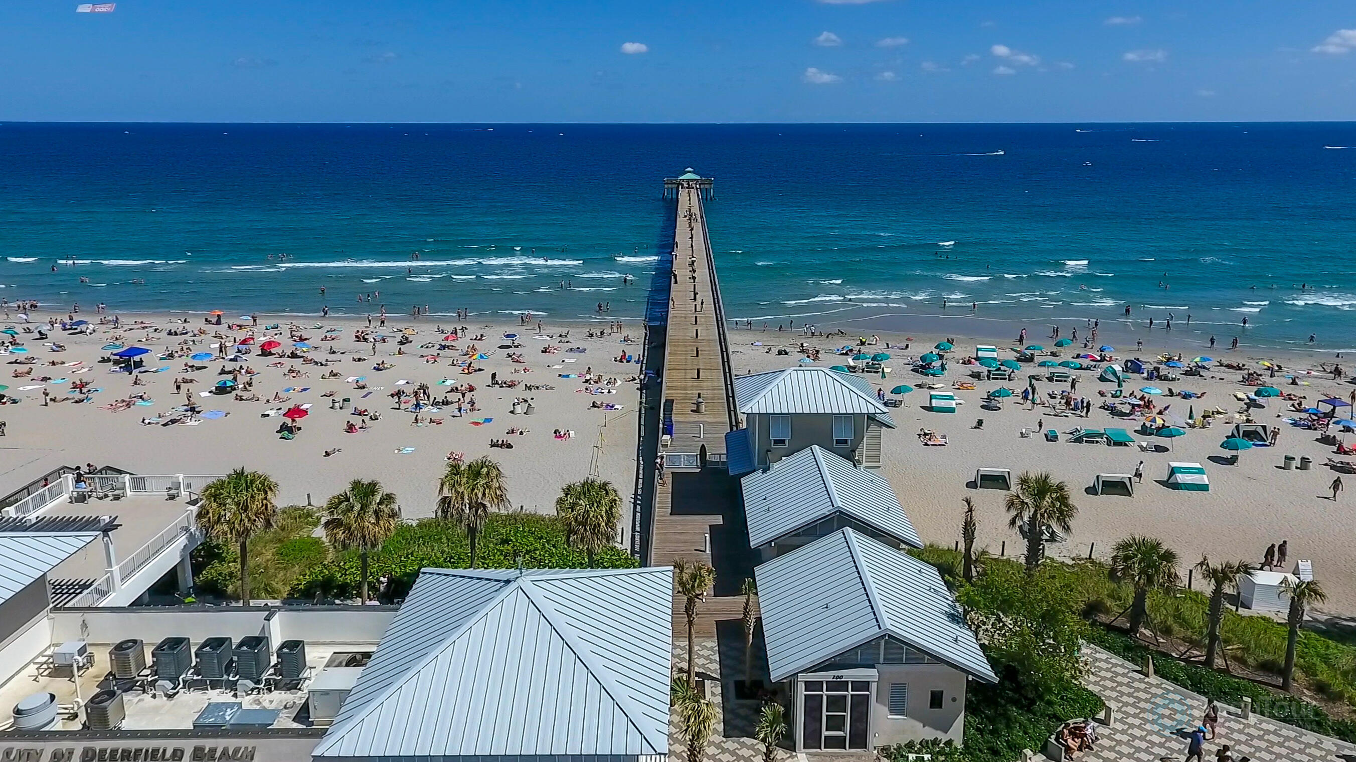 2136 Northeast 44th Street, Unit 4 Lighthouse Point, FL 33064 - Photo 50 of 51 a view of a terrace with lawn chairs