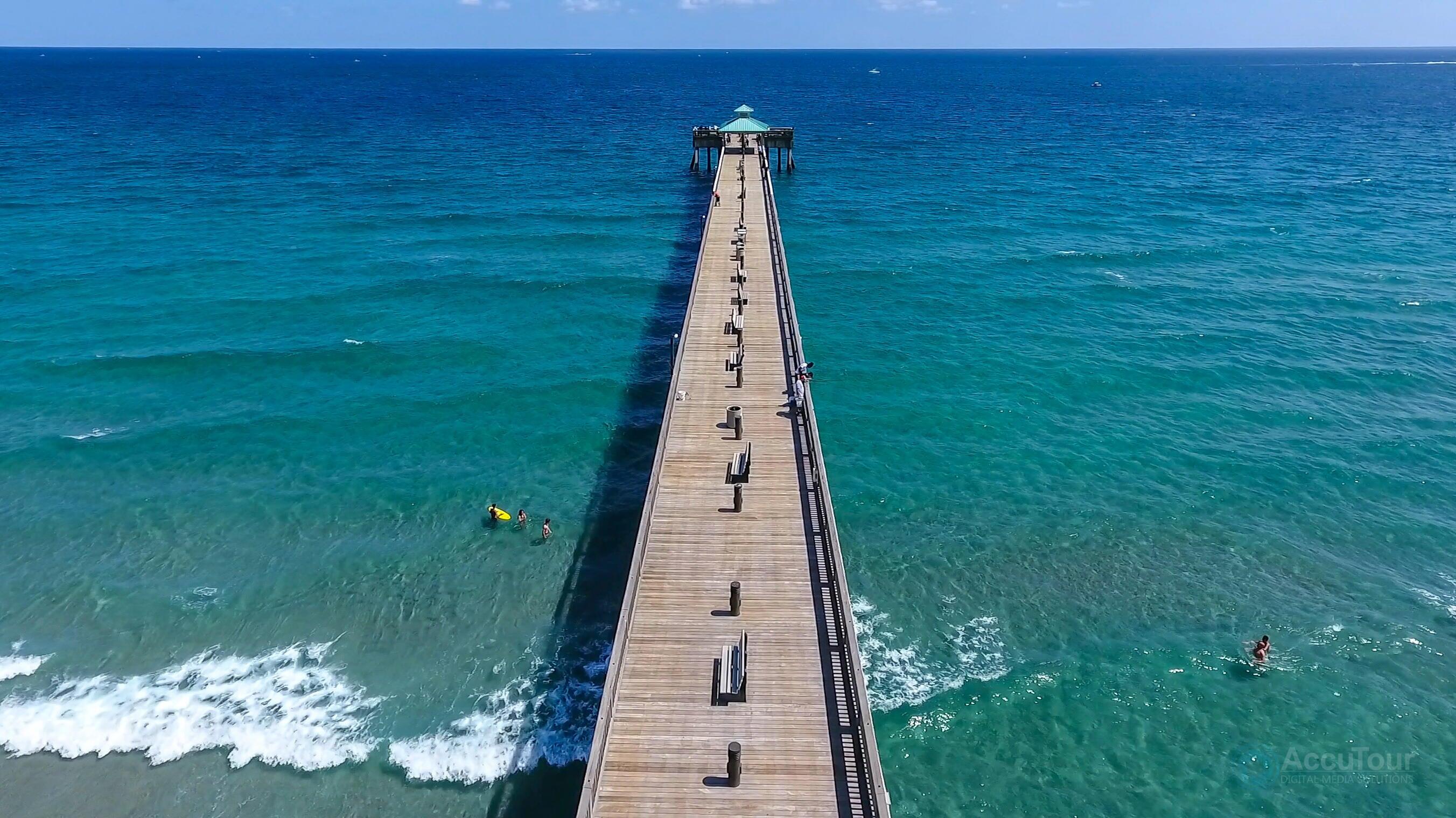 2136 Northeast 44th Street, Unit 4 Lighthouse Point, FL 33064 - Photo 51 of 51 a view of a yard with an outdoor space