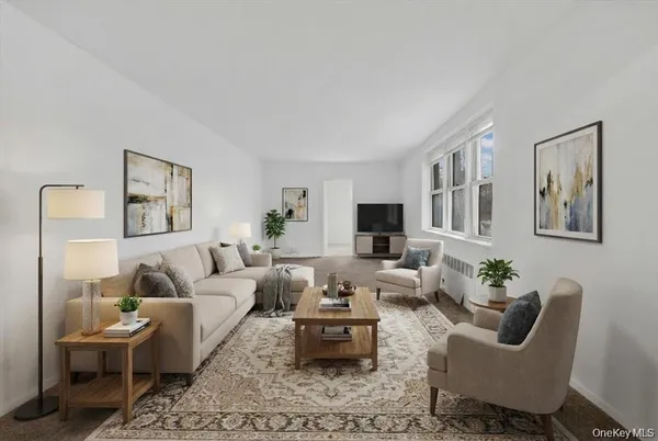 a living room with furniture or couch and a flat screen tv