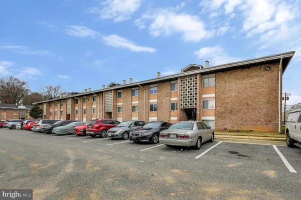 a cars parked in front of a building
