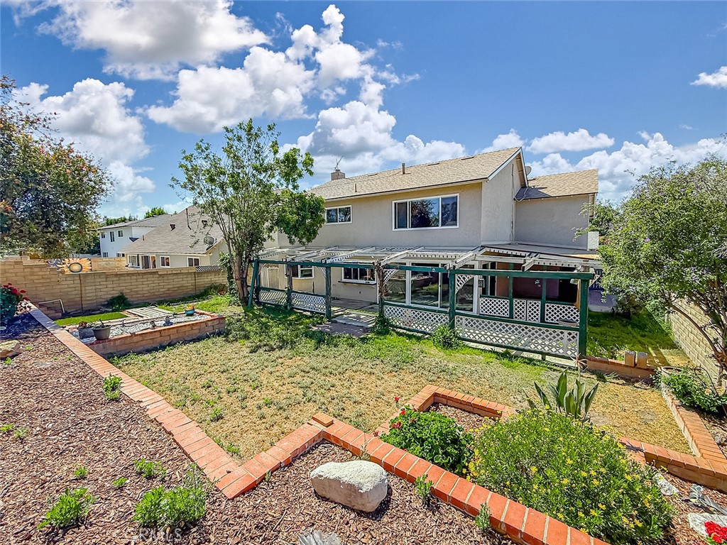 2235 Burnside Street Simi Valley, CA 93065 - Photo 57 of 71 a view of a house with backyard and sitting area