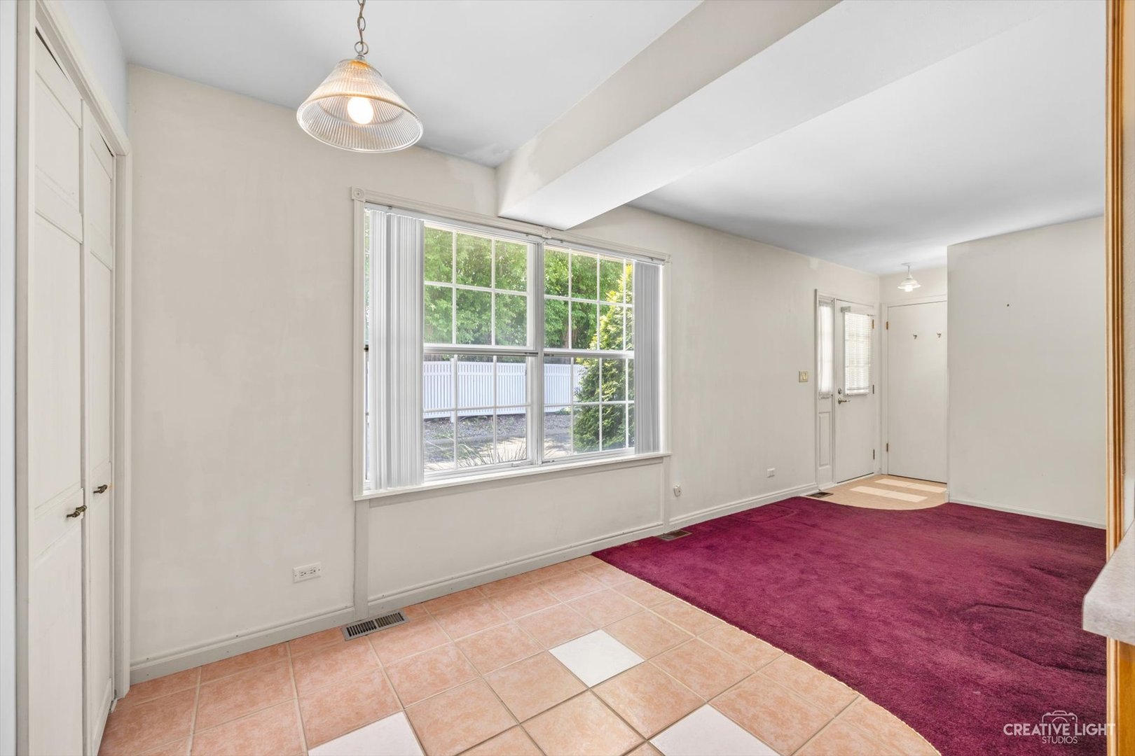 1520 Timber Trail, Unit 17B Wheaton, IL 60189 - Photo 8 of 17 a bedroom with a bed and a window