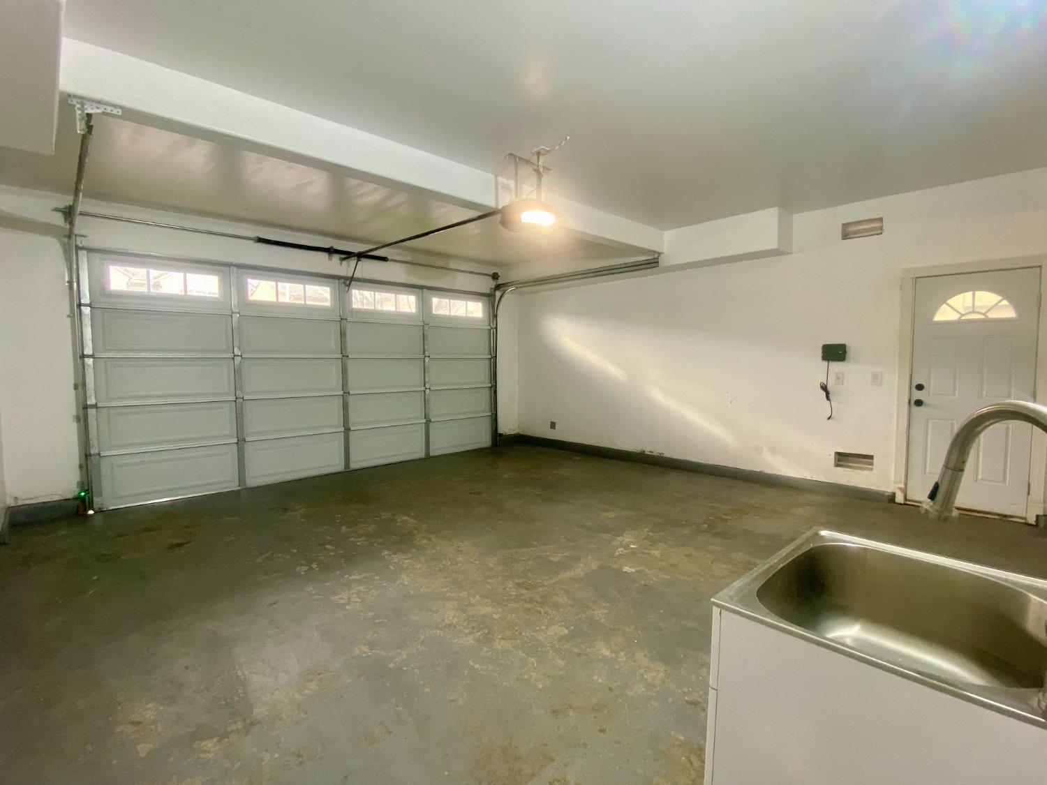 1227 CAVALAIRE Court Merced, CA 95348 - Photo 31 of 34 a view of a garage