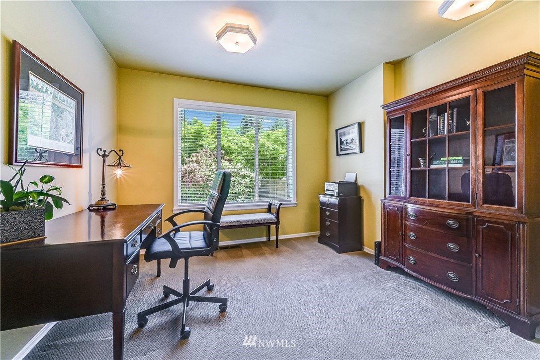 2716 187th Street Southeast Bothell, WA 98012 - Photo 13 of 37 a living room with furniture and a window