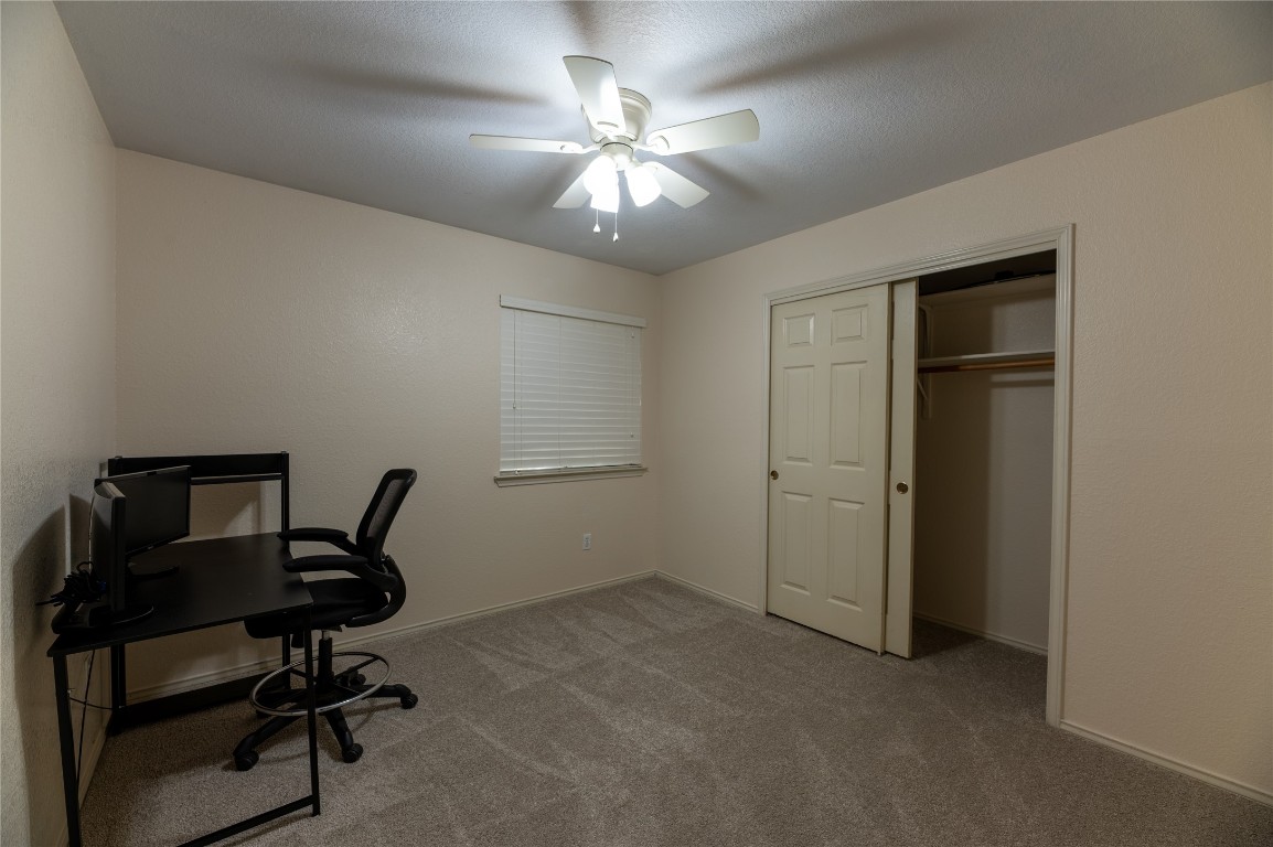 2604 Hutton Lane Leander, TX 78641 - Photo 19 of 27 a view of a workspace with furniture and a window