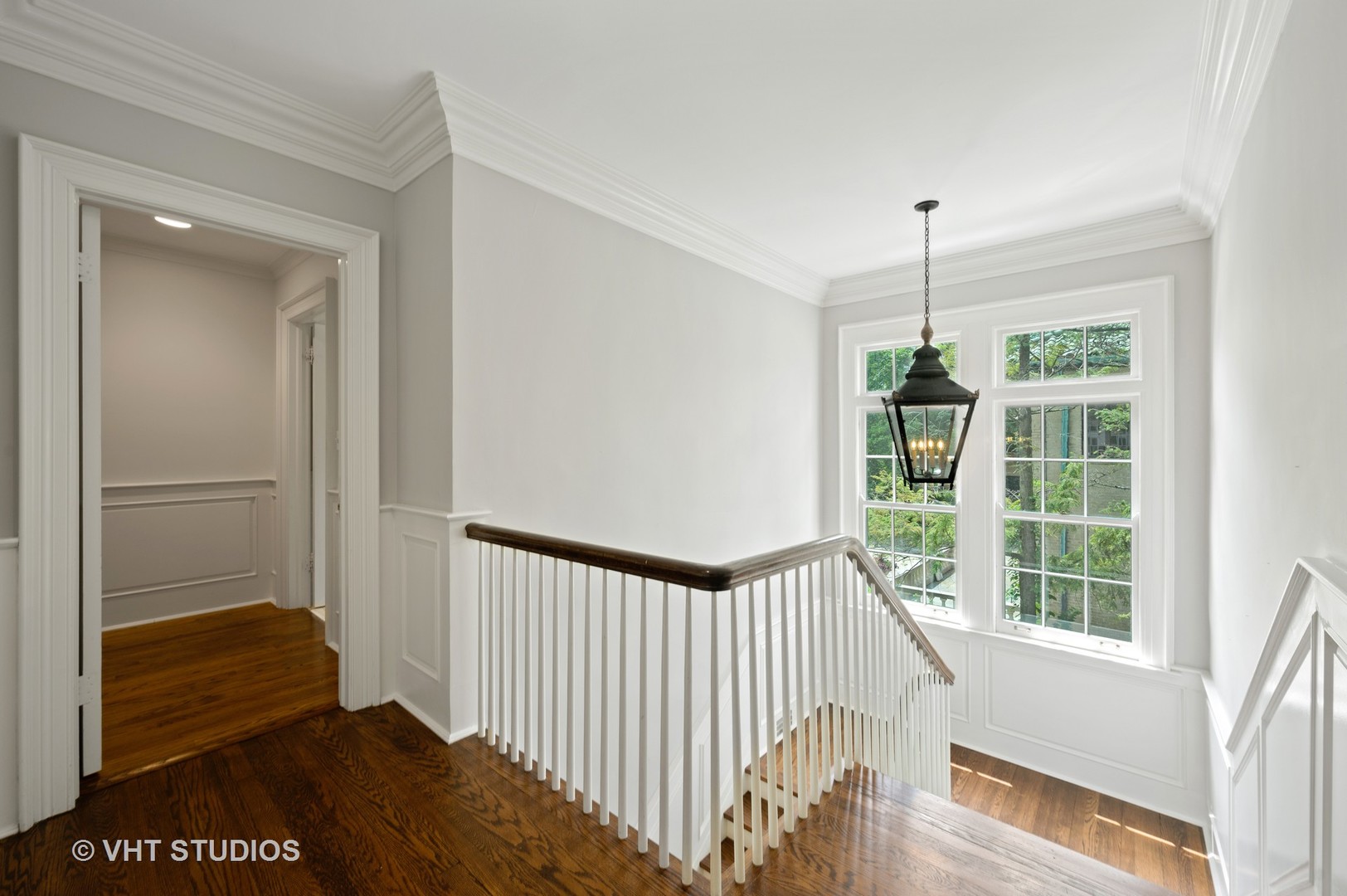 1010 Chestnut Avenue Wilmette, IL 60091 - Photo 19 of 48 a view of a hallway view with wooden floor and a window
