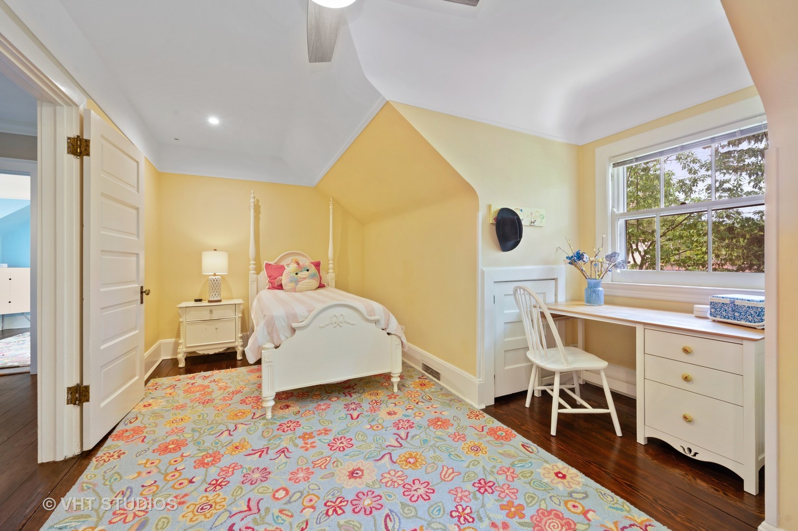 1010 Chestnut Avenue Wilmette, IL 60091 - Photo 31 of 48 a bedroom with a bed and a dresser next to a window