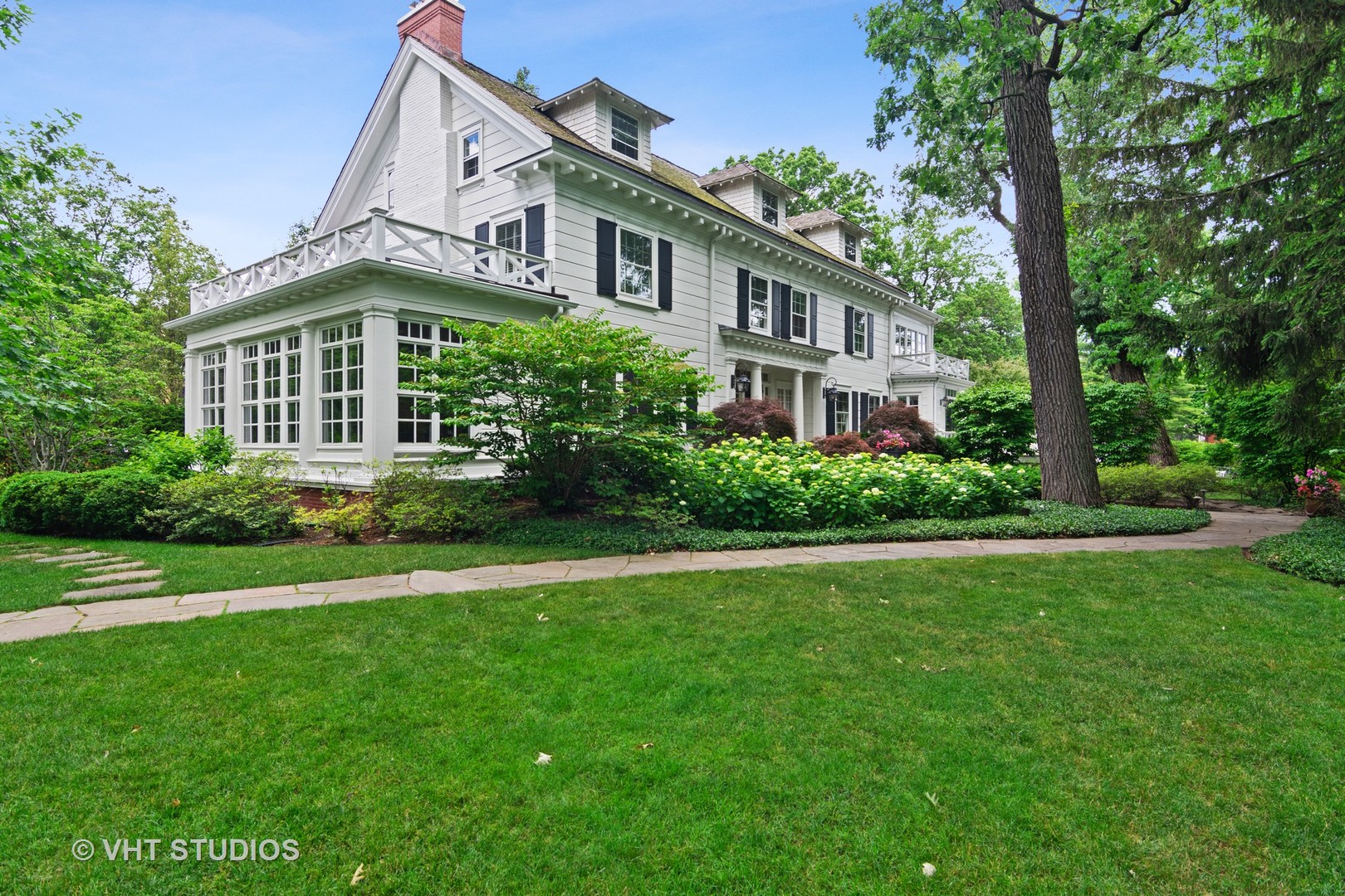 1010 Chestnut Avenue Wilmette, IL 60091 - Photo 42 of 48 a front view of a house with a yard