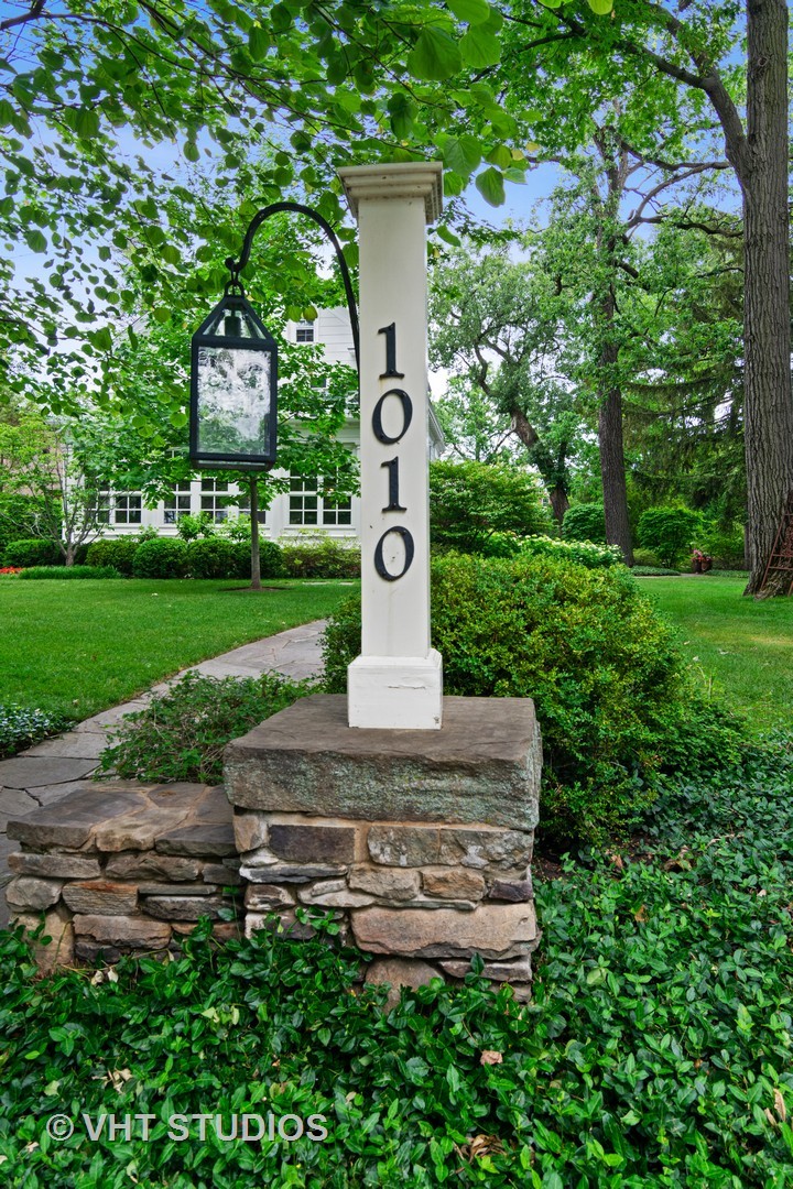 1010 Chestnut Avenue Wilmette, IL 60091 - Photo 43 of 48 a front view of a house with garden