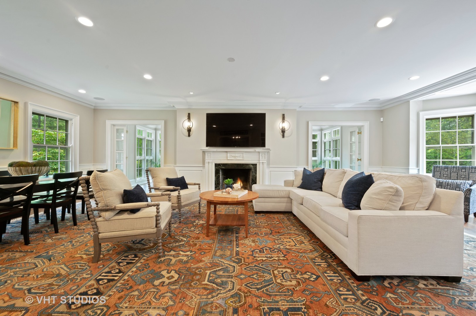 1010 Chestnut Avenue Wilmette, IL 60091 - Photo 8 of 48 a living room with furniture a flat screen tv and a fireplace