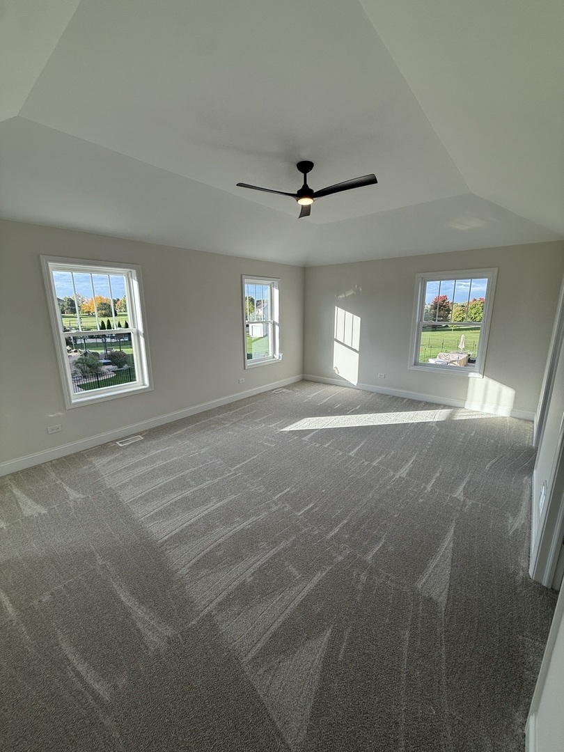 1920 Edmonds Avenue New Lenox, IL 60451 - Photo 18 of 35 a view of empty room with windows and ceiling fan